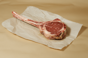 Cowboy ribeye raw cut showing marbling