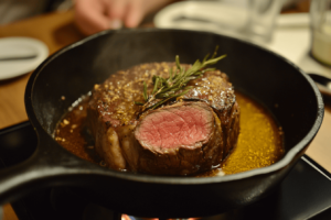 Step-by-step searing a ribeye roast in cast-iron pan